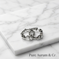 Boucles d'oreilles créoles Huggie en argent sterling avec oxydes de zirconium sertis clos