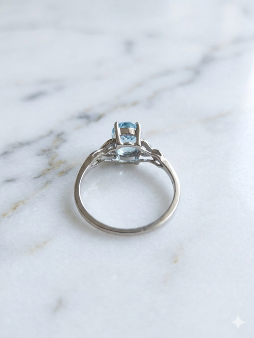 10K White Gold Oval Blue Topaz Ring