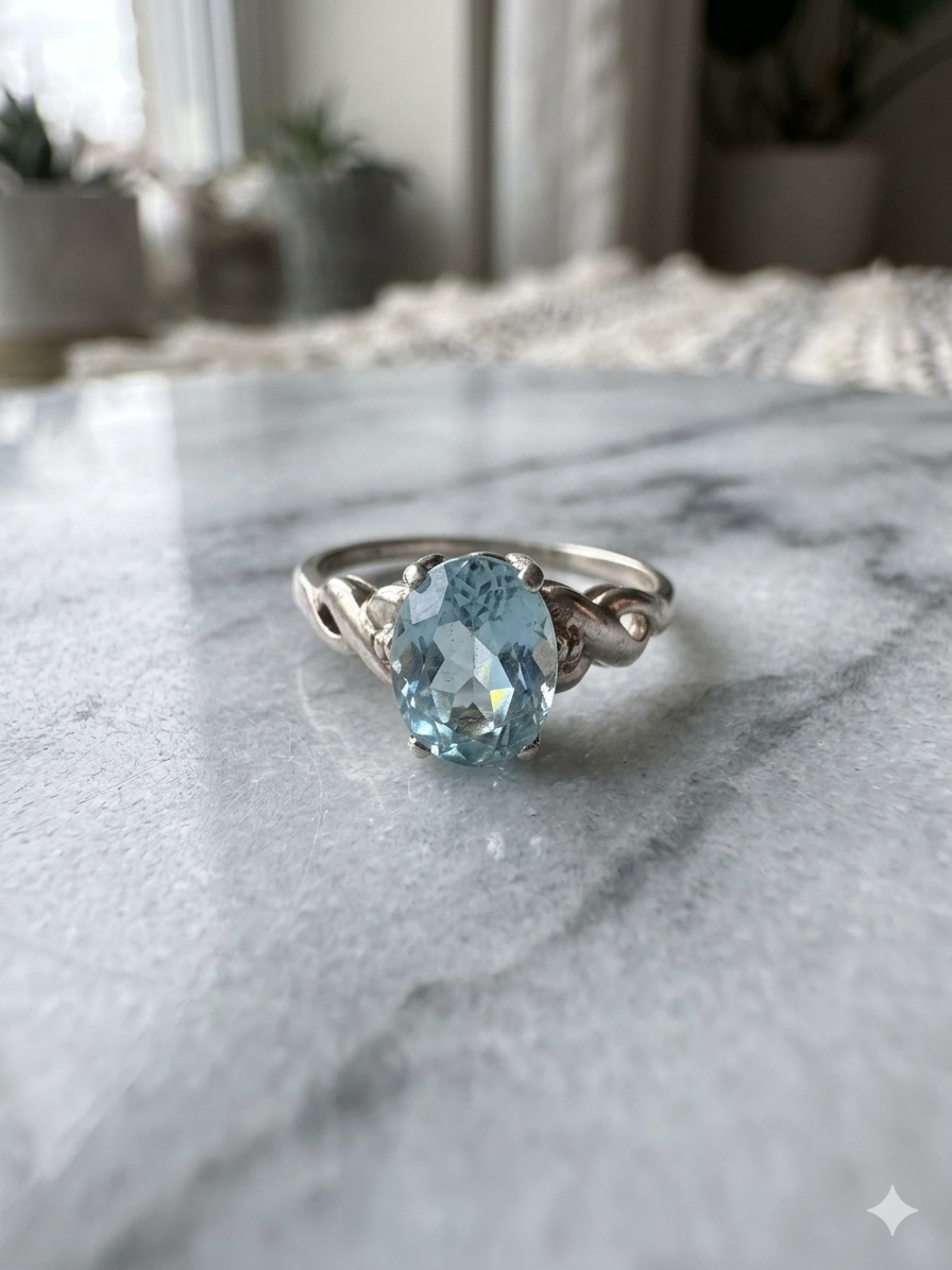 10K White Gold Oval Blue Topaz Ring
