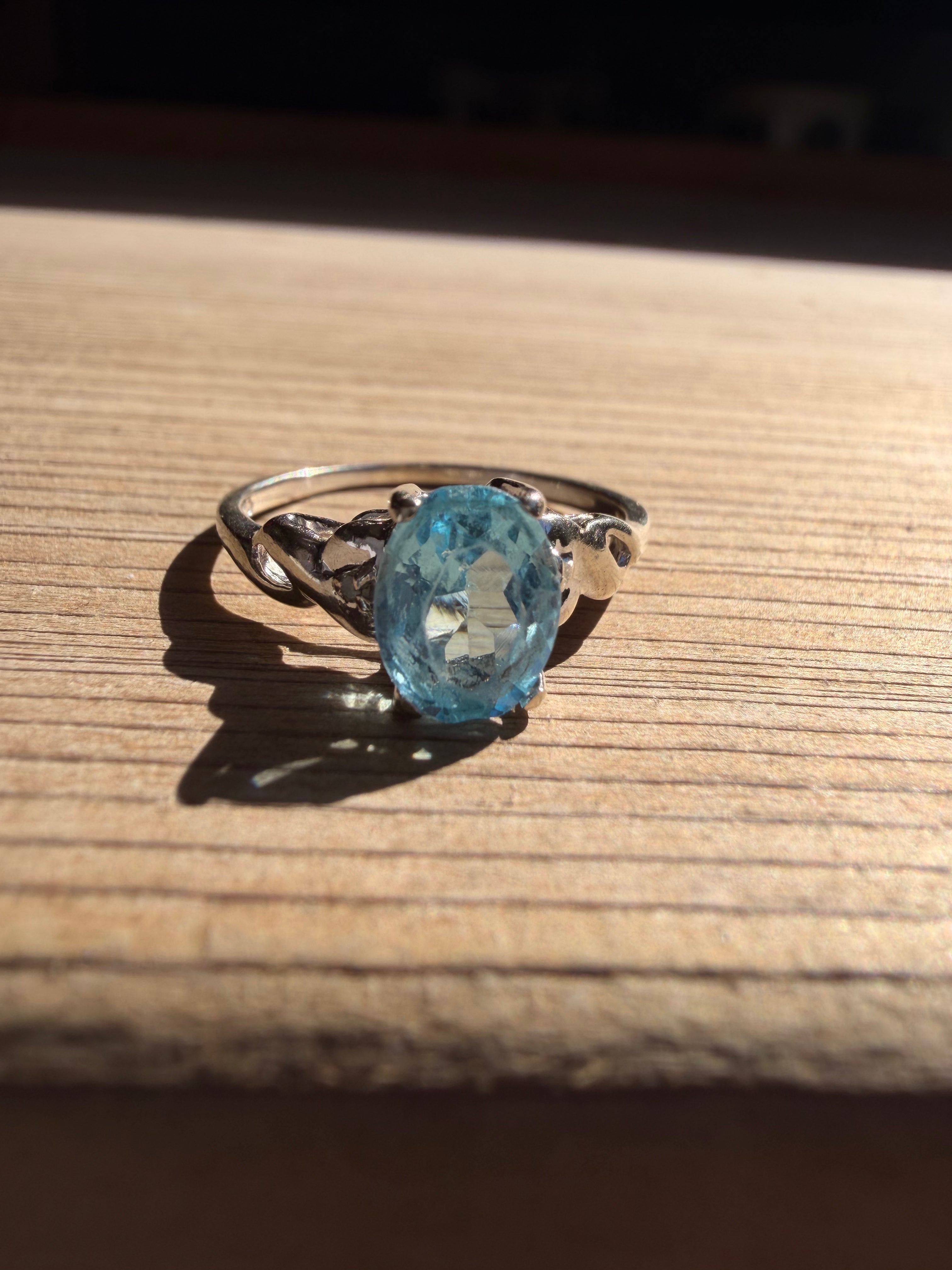 10K White Gold Oval Blue Topaz Ring