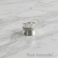 Anillo tipo cigarro ancho y cónico con detalle trenzado