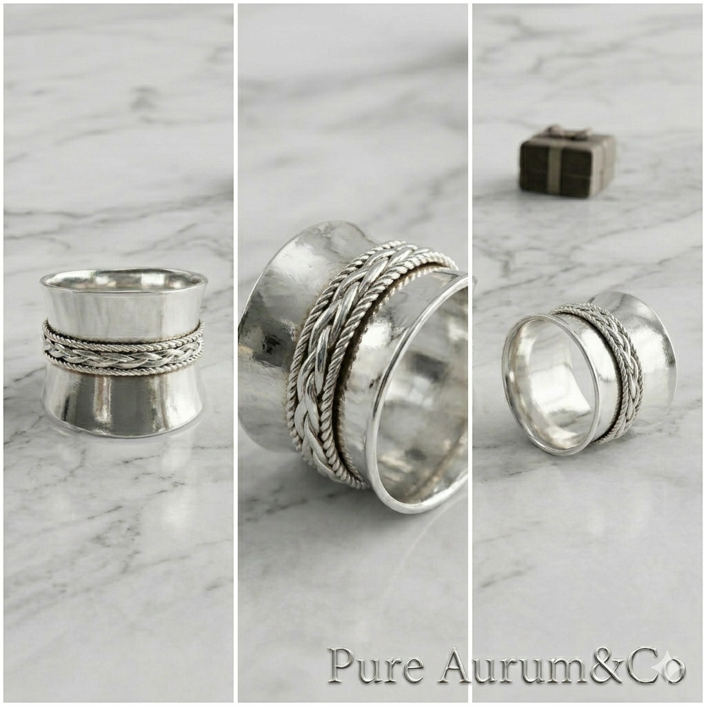 Anillo tipo cigarro ancho y cónico con detalle trenzado